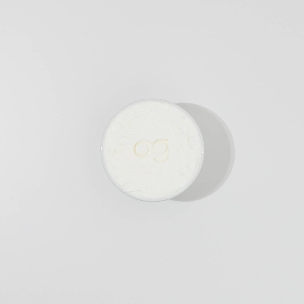 Solid Dish Soap in a white bowl by ardent goods