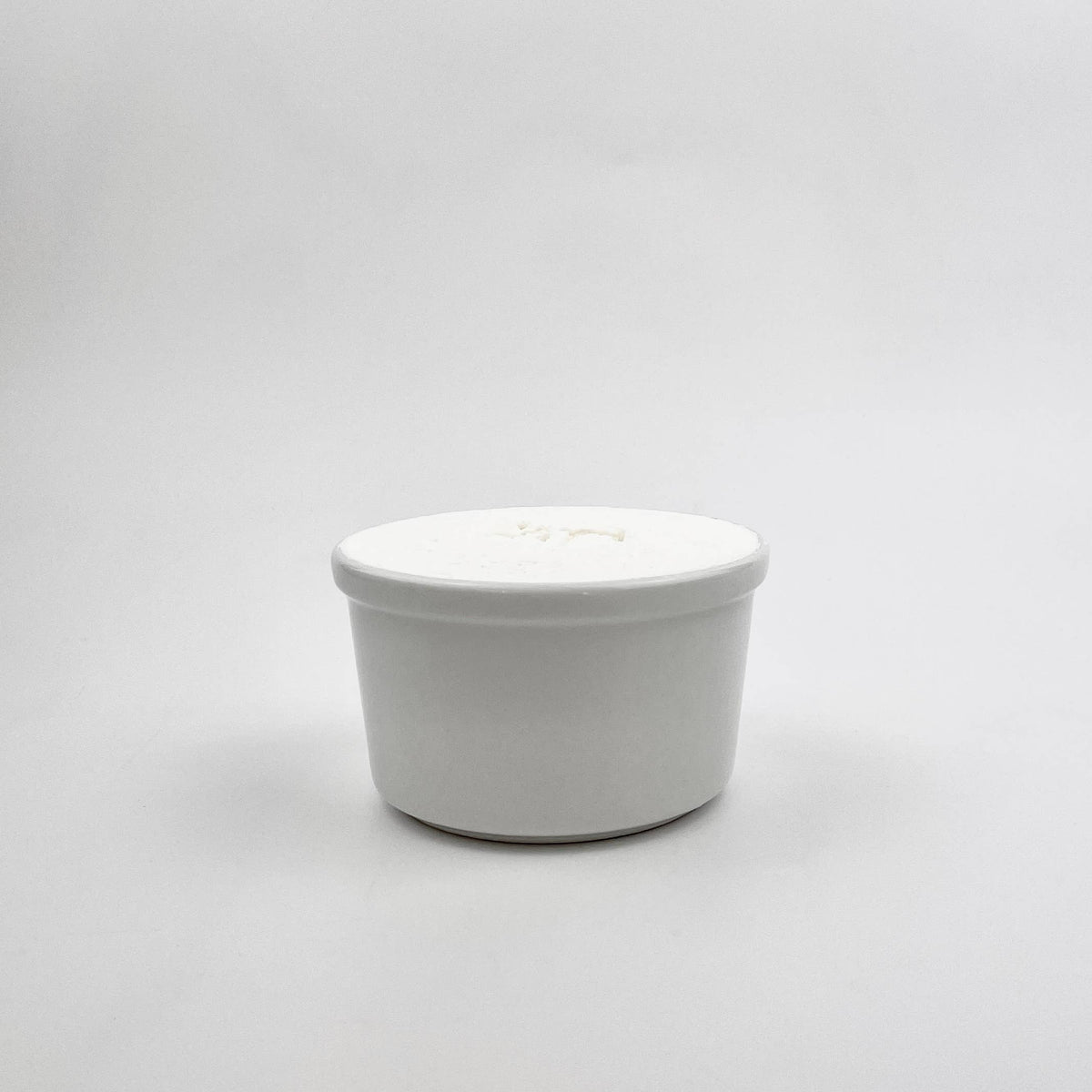 Solid Dish Soap in a white bowl by ardent goods